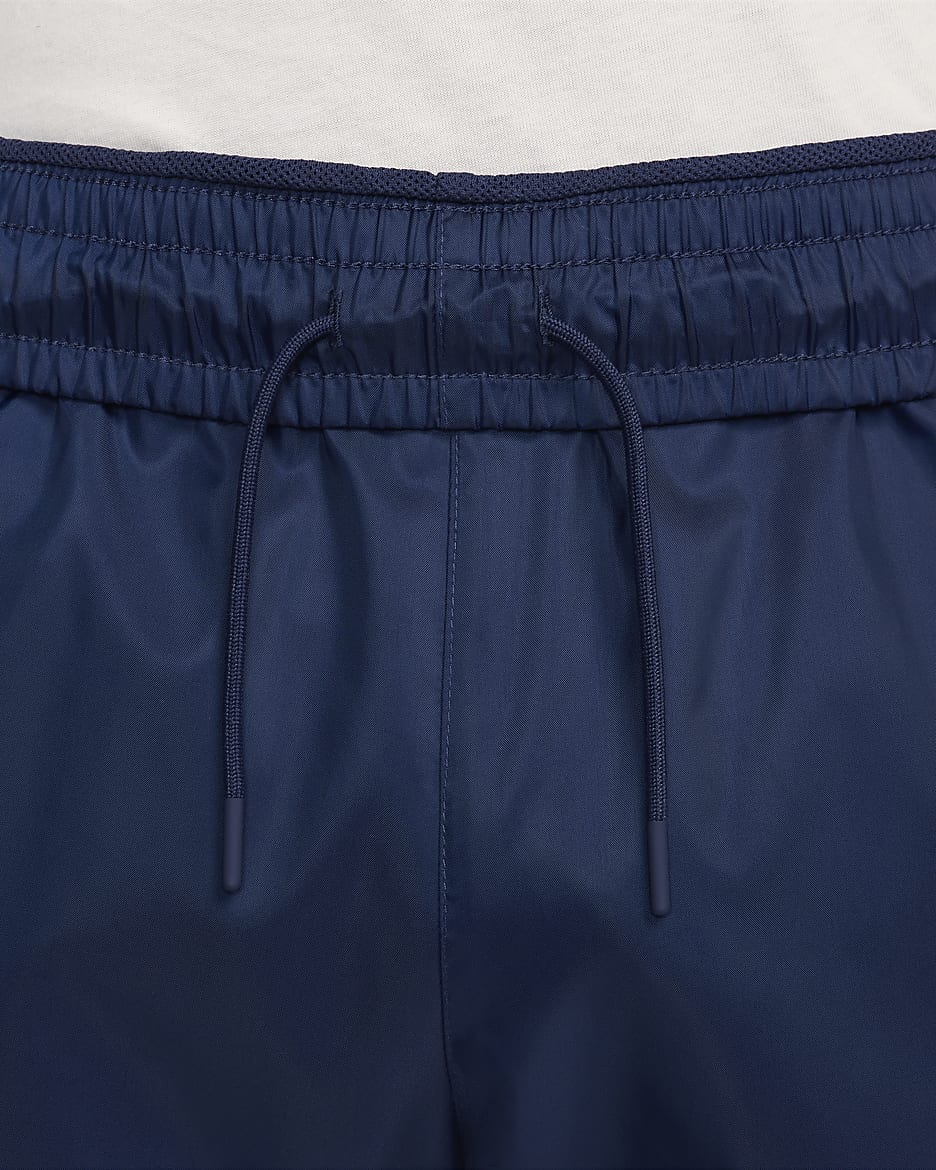 Nike windrunner pants blue on sale